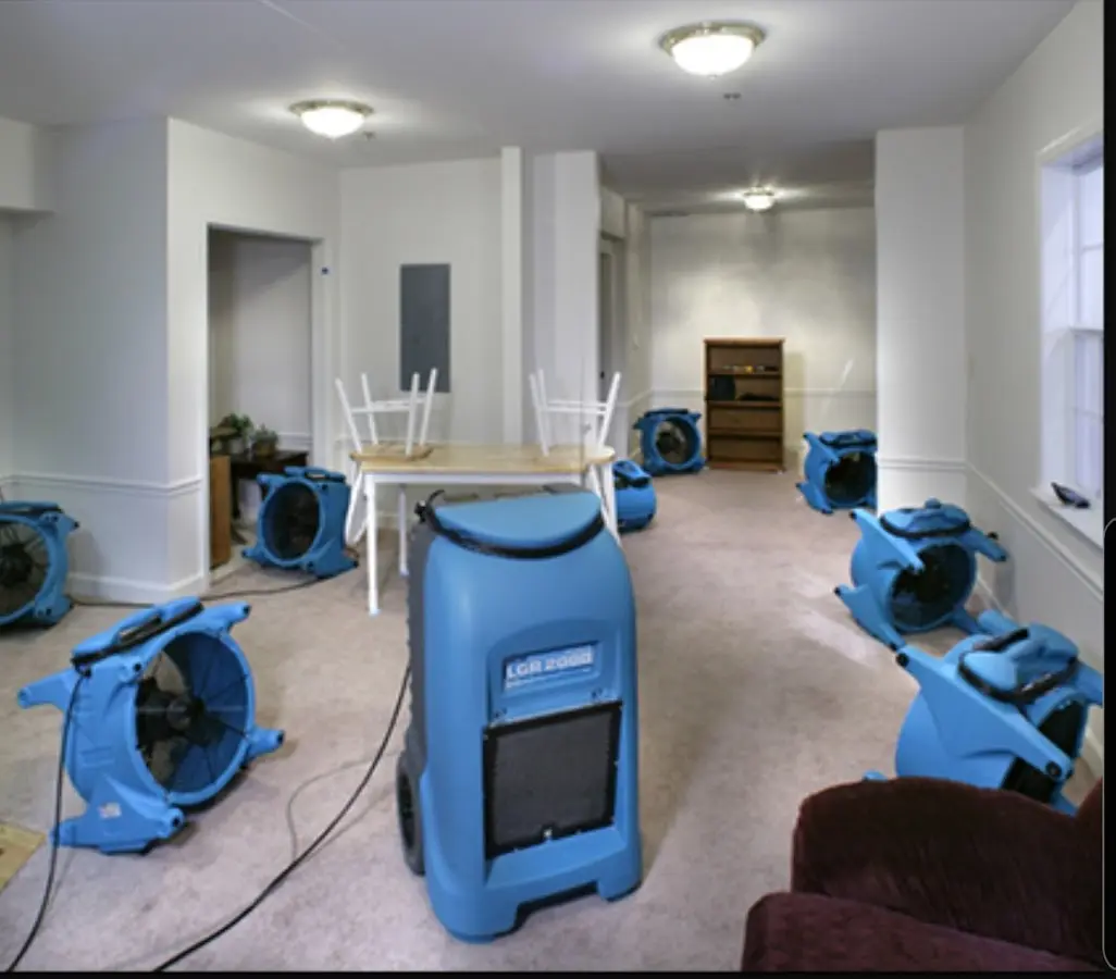 Air movers and dehumidifier setup for Water Damage Restoration in Wilkins